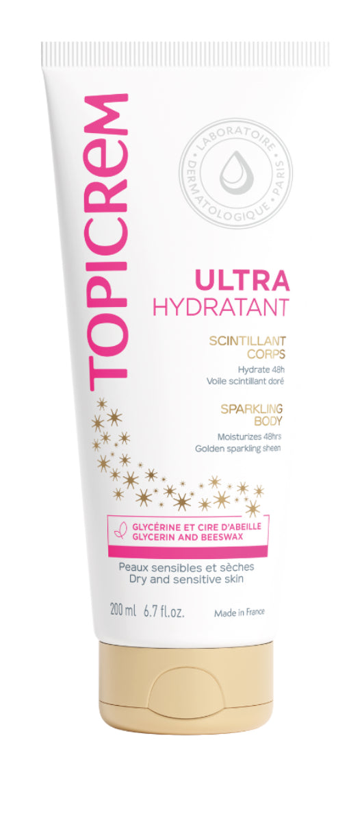 Topicrem crema ultra hidratante brillo dorada